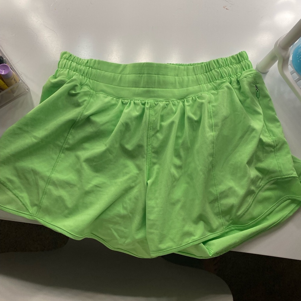 Size 6, 4 inch lululemon shorts in this neon lime green color